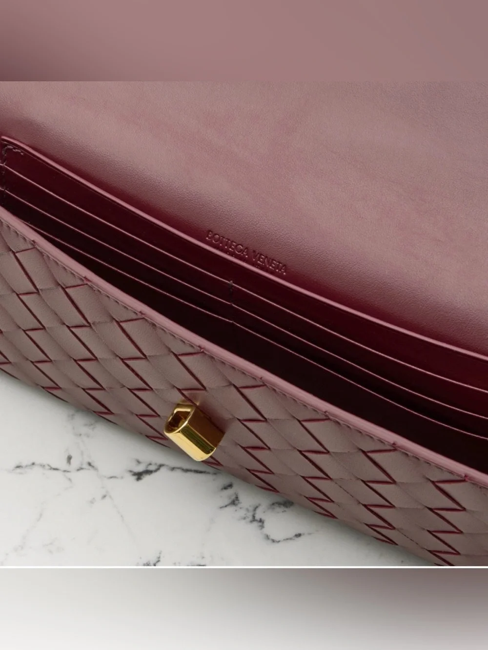 BOTTEGA VENETA Andiamo knot Intrecciato leather clutch